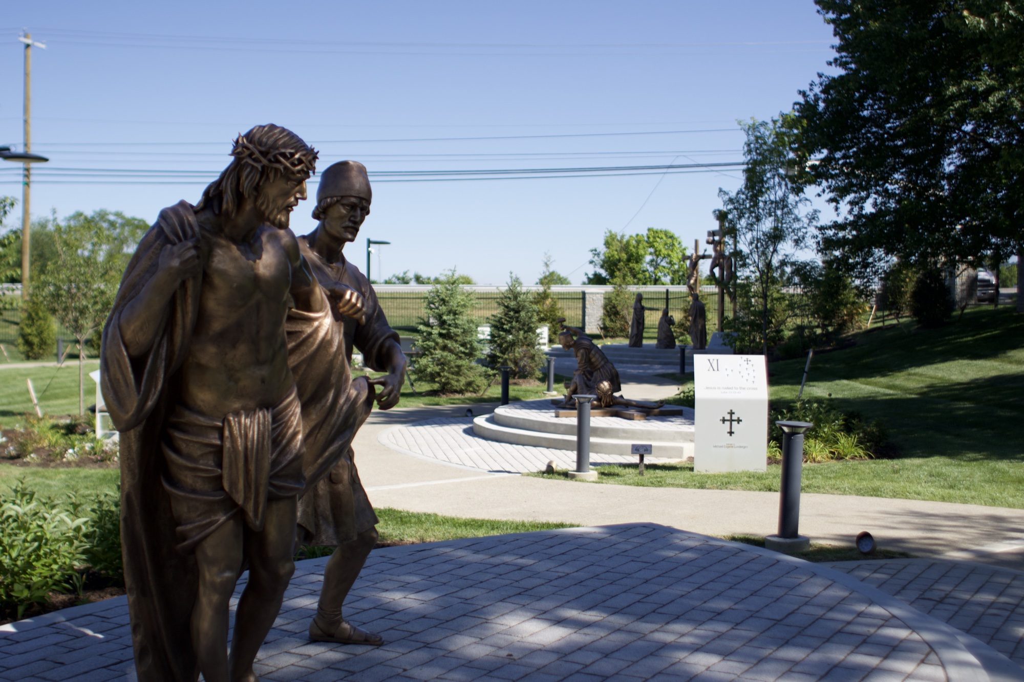 Bronze sculpture of Jesus stripped of his garments — Station X of the Stations of the Cross at the Gardens at St. Patrick’s.