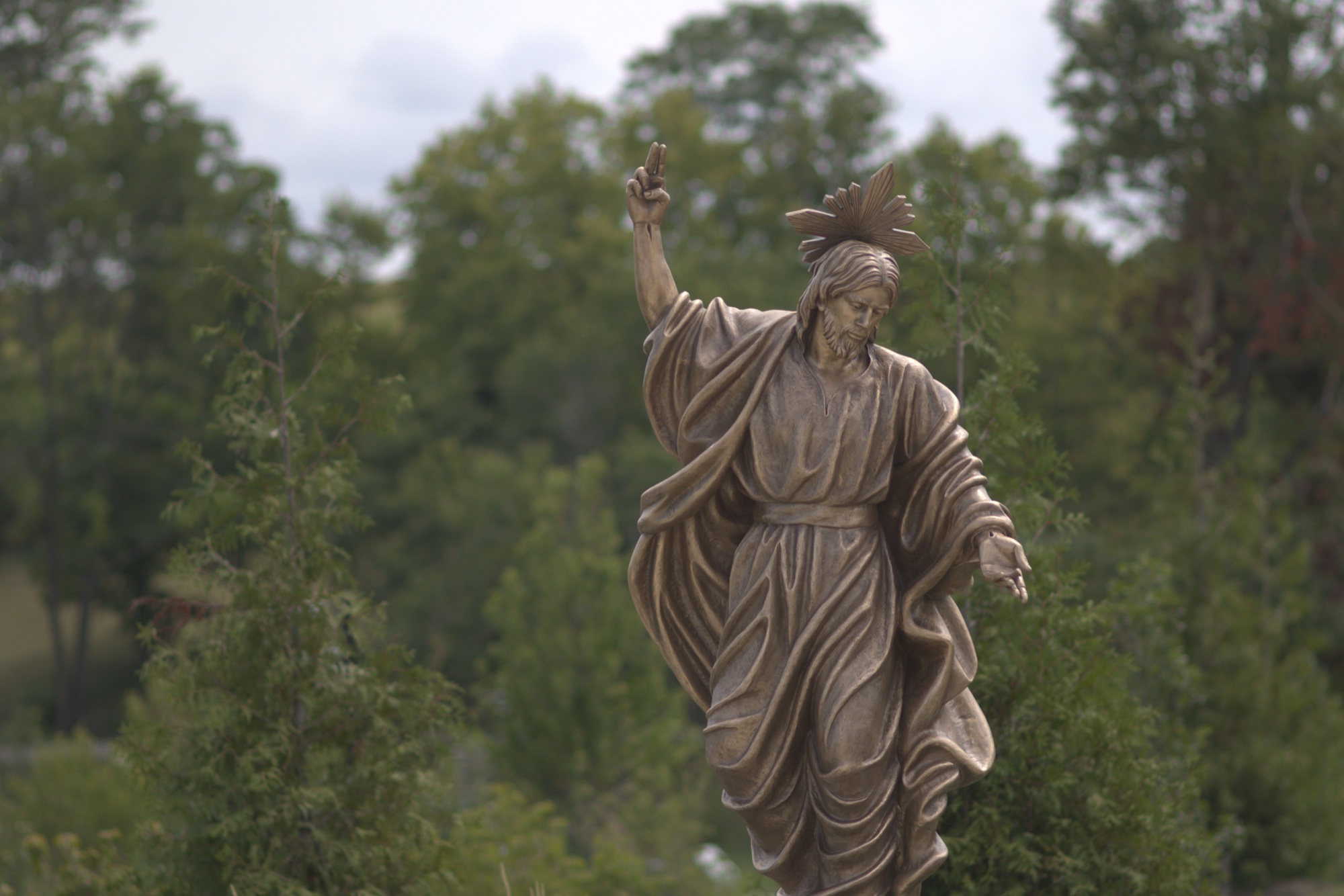 Bronze sculpture of the risen Christ — Station XV of the Stations of the Cross at the Gardens at St. Patrick’s.