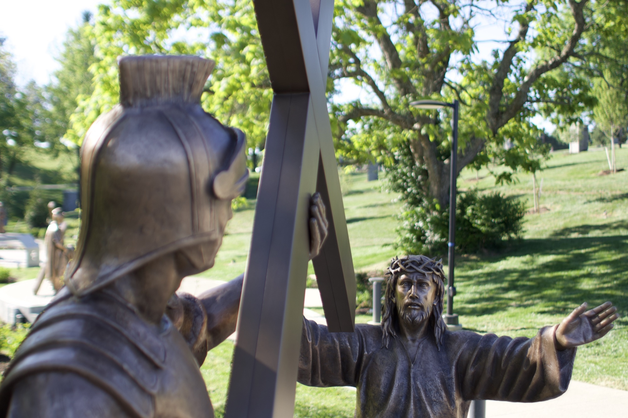 Bronze sculpture of Jesus taking up his cross — Station II of the Stations of the Cross at the Gardens at St. Patrick’s.