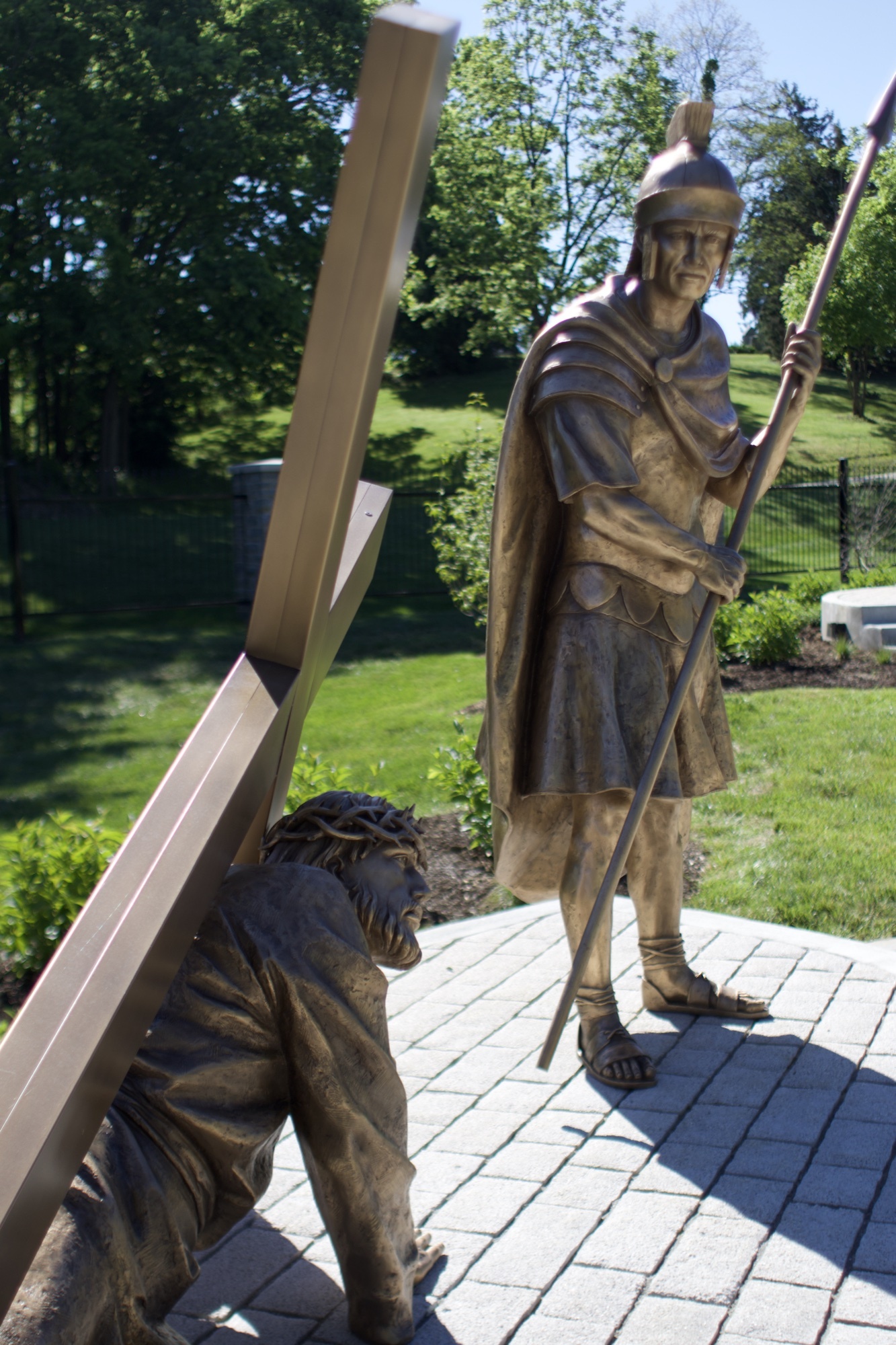 Bronze sculpture of Jesus falling the second time — Station VII of the Stations of the Cross at the Gardens at St. Patrick’s.