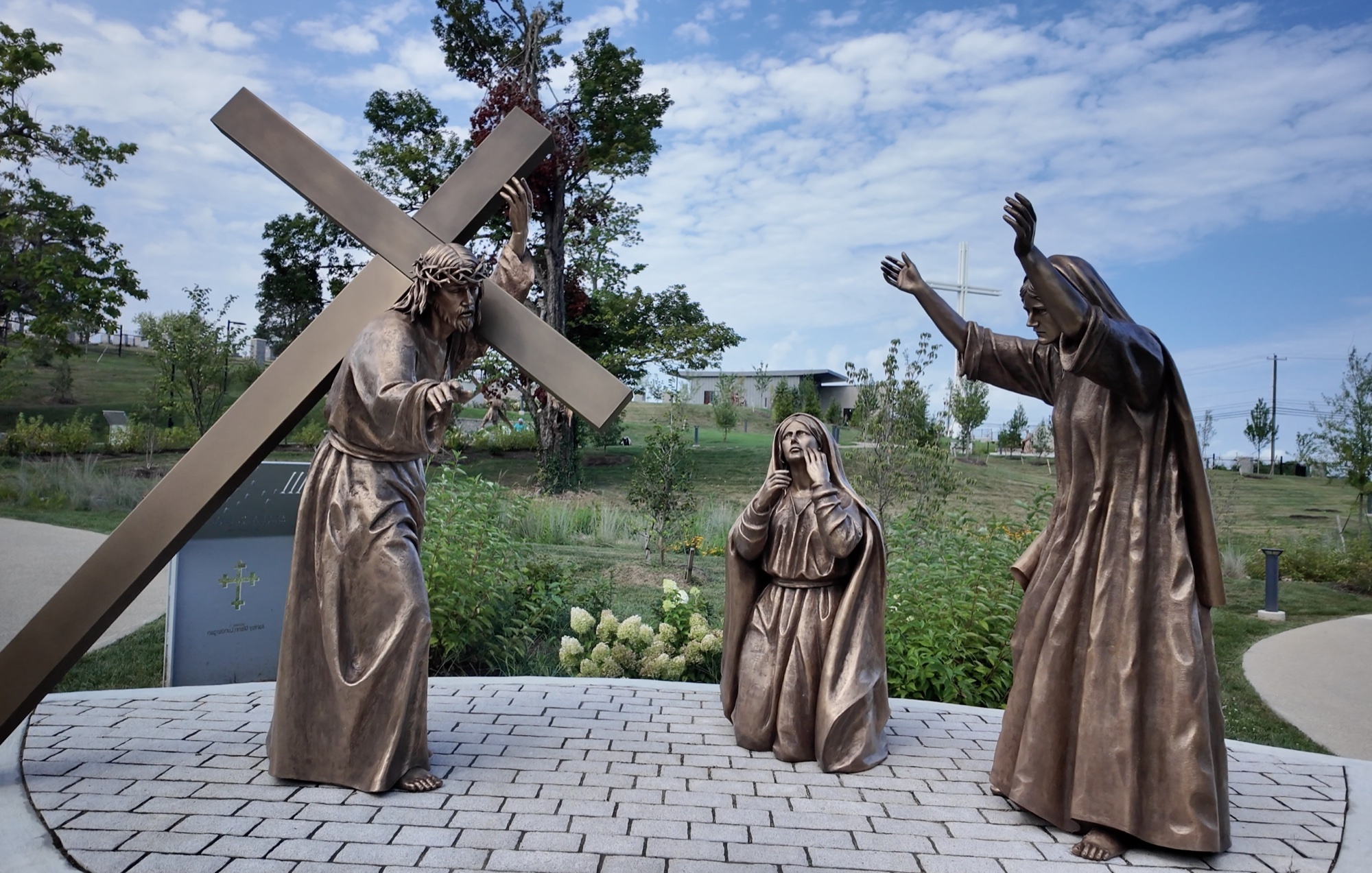 Bronze sculpture of Jesus meeting the women of Jerusalem — Station VIII of the Stations of the Cross at the Gardens at St. Patrick’s.